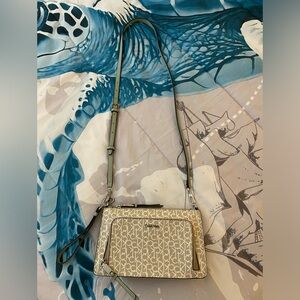 NWOT Calvin Klein cream color monogram crossbody bag